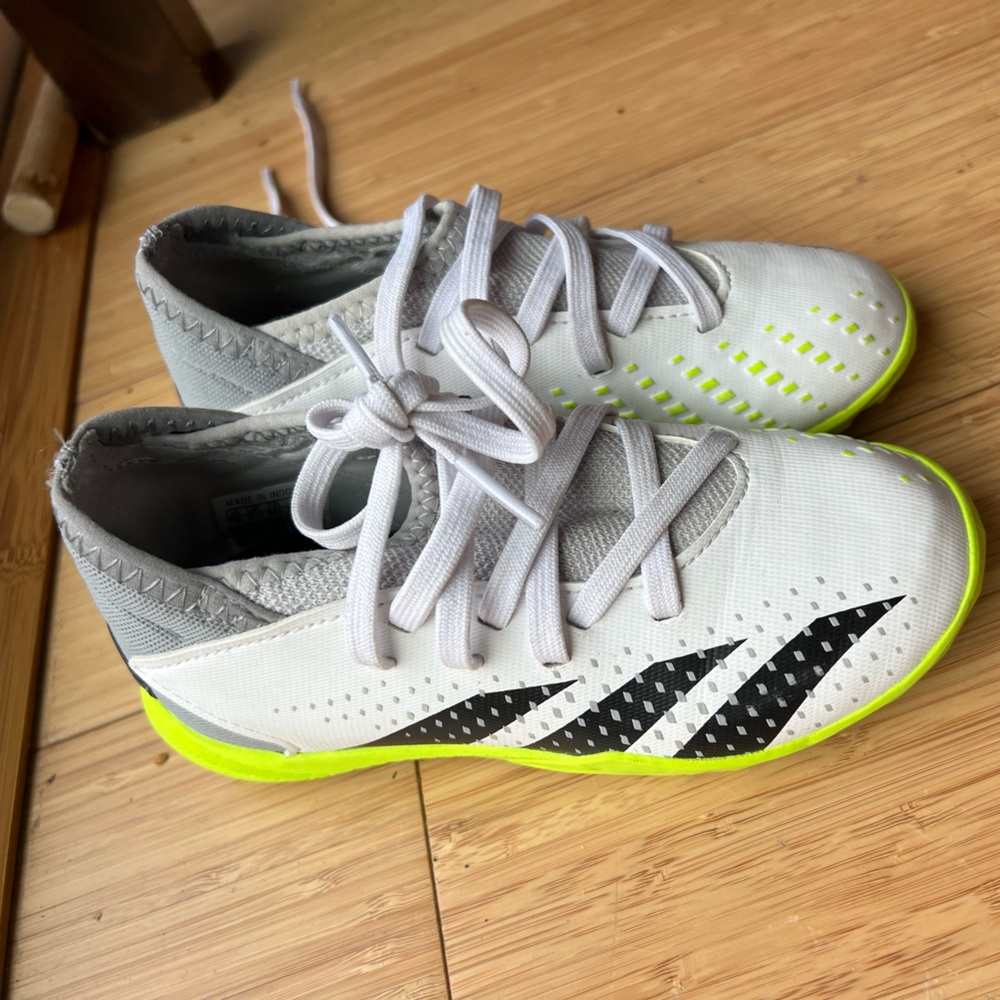 Kids adidas soccer cleats.